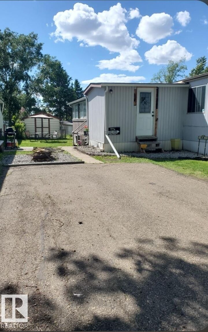Property Photo: 14 Willowdale Drive NW AB T6P 1G4
