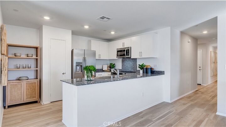 Property Photo:  7518 Vassar Avenue  CA 92345 