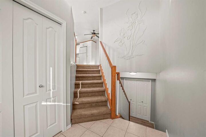 Property Photo:  4626 44 Street 5  AB T4S 1W7 