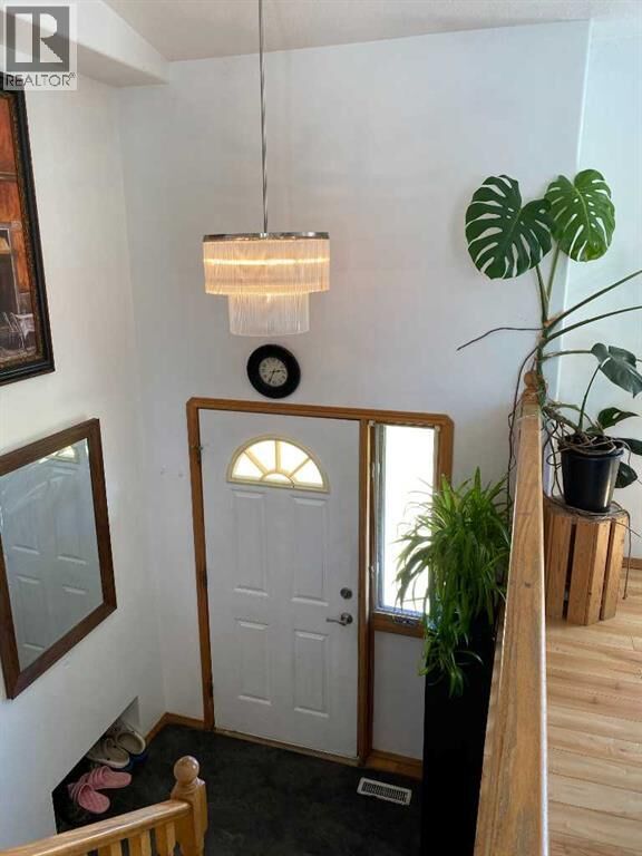 Property Photo: 52 Upland Drive West AB T1R 0P5