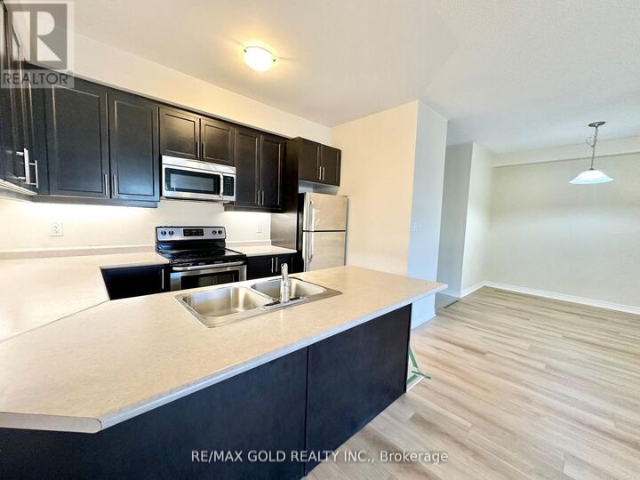 Property Photo: 263 Georgian Drive 308 ON L6H 0L2