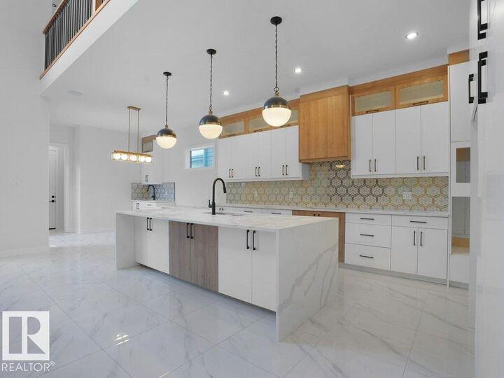Property Photo: 6730 Crawford Way SW AB T6W 4L8