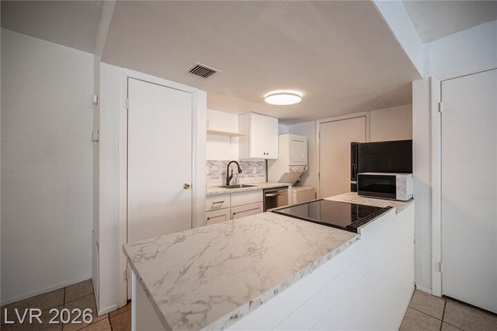 Property Photo: 1428 Lorilyn Avenue 3 NV 89119