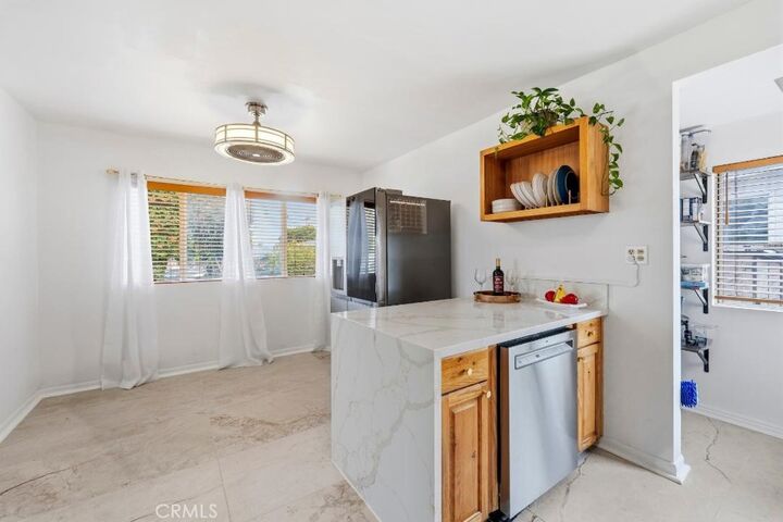 Property Photo:  5055 N Raton  CA 90807 