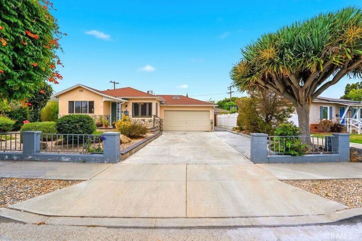 Property Photo:  5055 N Raton  CA 90807 