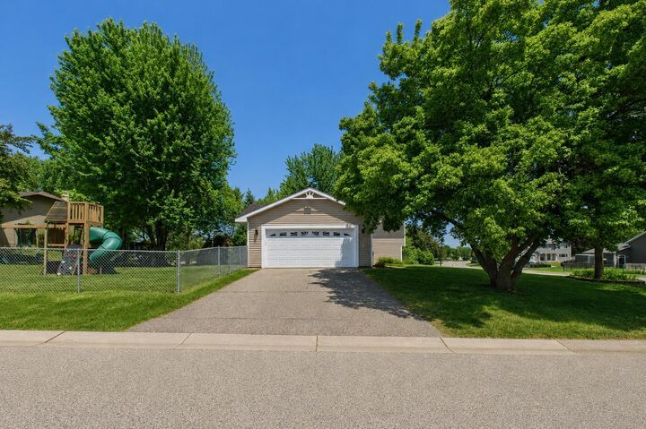 Property Photo:  7598 Upper 23rd Street N  MN 55128 