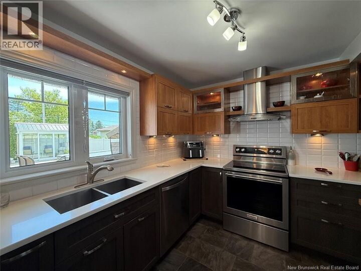 Property Photo:  59 42E Avenue  NB E3V 2Z4 