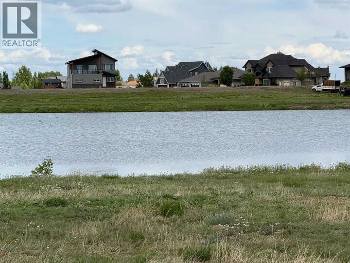 Property Photo:  27 Kingfisher Estates  AB T1R 1C5 