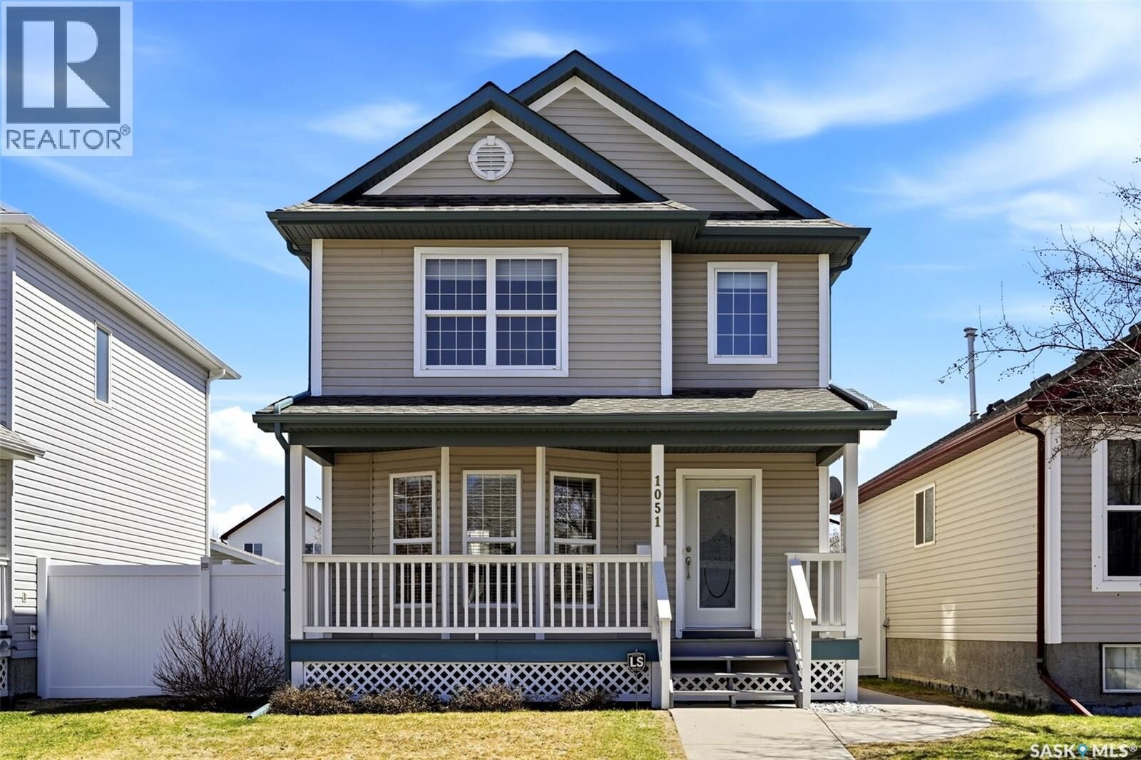 Property Photo: 1051 Snowberry Way N SK S4X 4P5