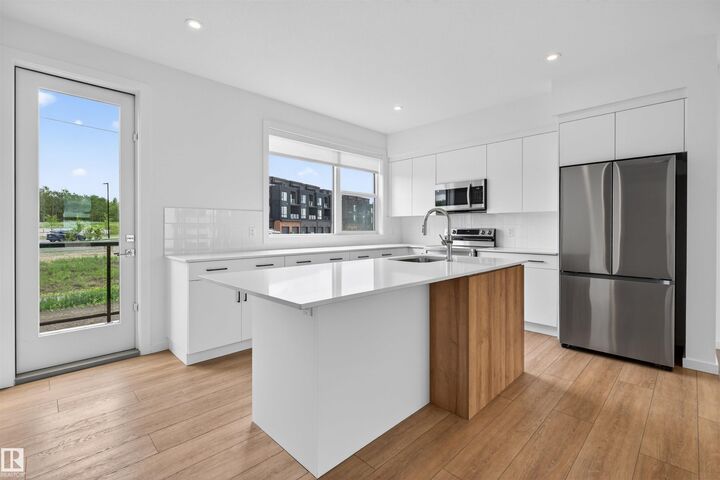 Property Photo: 5 Rondeau Drive 4 AB T8N 7X8