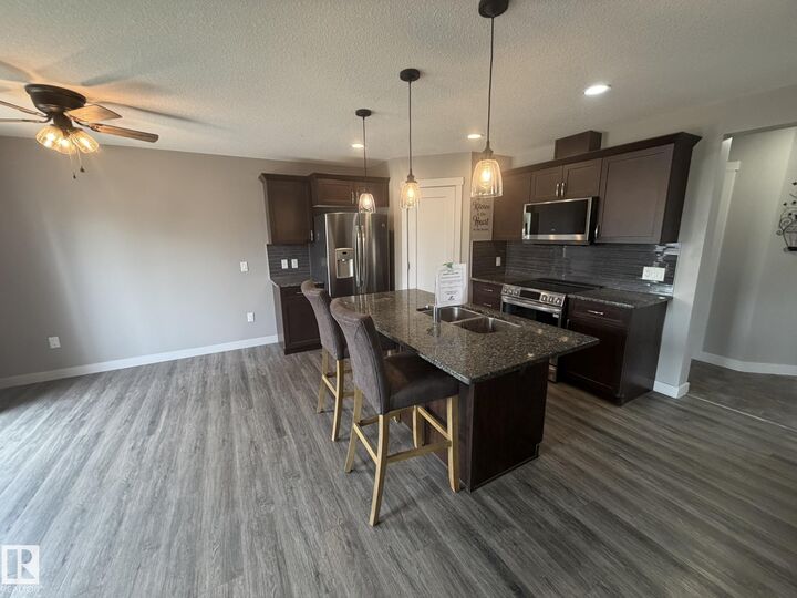 Property Photo: 6821 Evans Wynd NW AB T6M 0T3