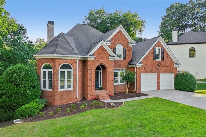 Property Photo:  6010 Masters Club Drive  GA 30024 