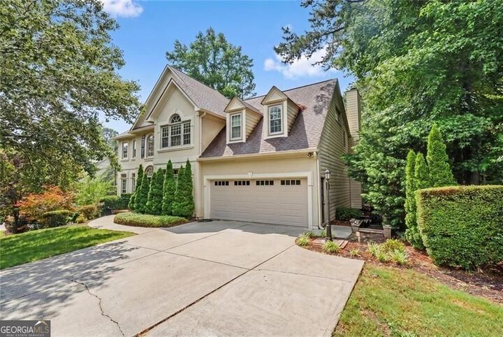 Property Photo: 7130 Amberleigh Way GA 30097