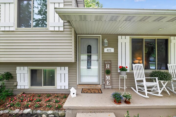 Property Photo:  421 White Oak Drive  MI 48872 