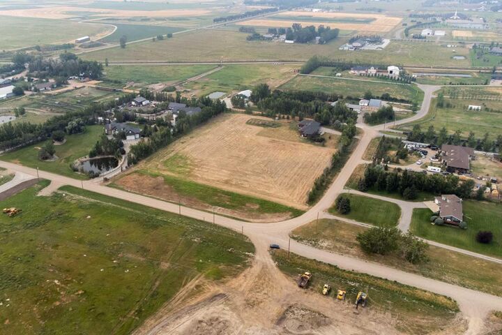 Property Photo: 56-210044 Highway 512 AB T1J 5N9