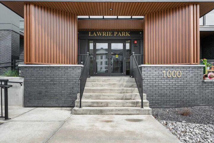 Property Photo: 100 Banister Drive 1102 AB T1S 5Y2
