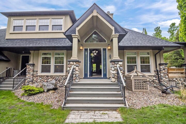 Property Photo: 162052 Priddis Valley Road W AB T0L 1W2
