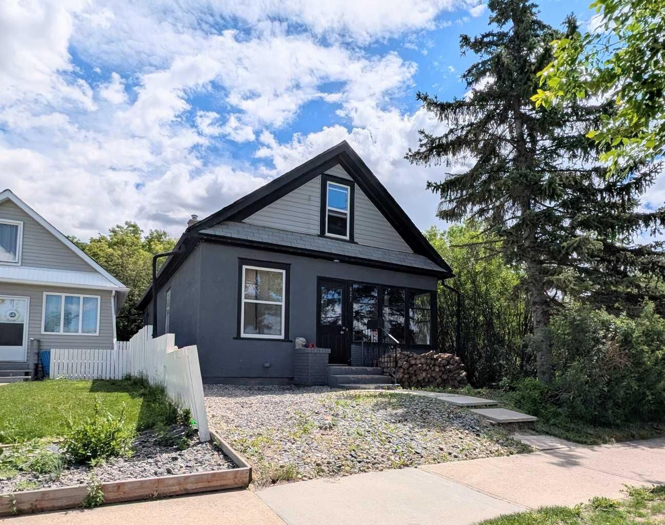 Property Photo: 421 12 Street N AB T1H 2G6