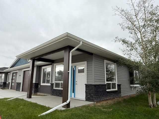 Property Photo: 4738 49A Avenue #4 AB T4L 1N4