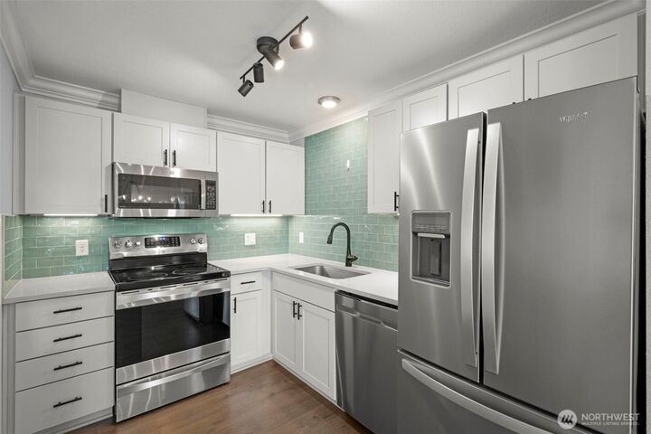 Property Photo:  23410  18th Avenue S C302  WA 98198 