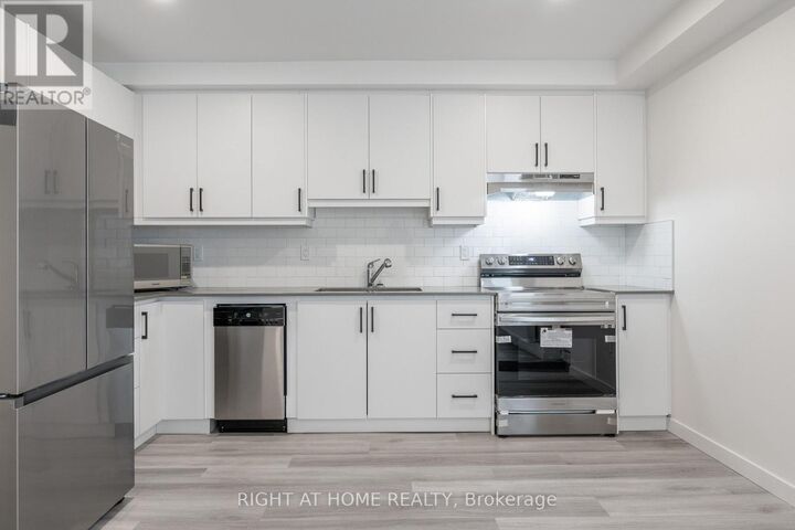 Property Photo:  1738 Wilson Avenue 13  ON M3L 1A5 