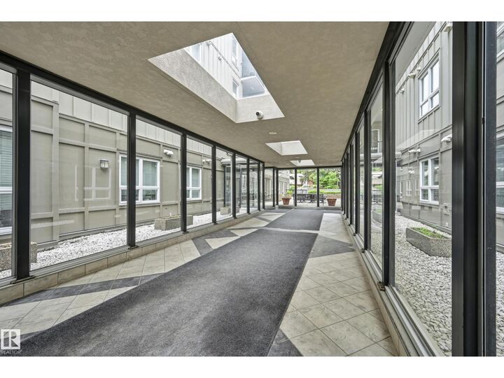 Property Photo:  #203 11103 84 Av NW  AB T6G 2X4 