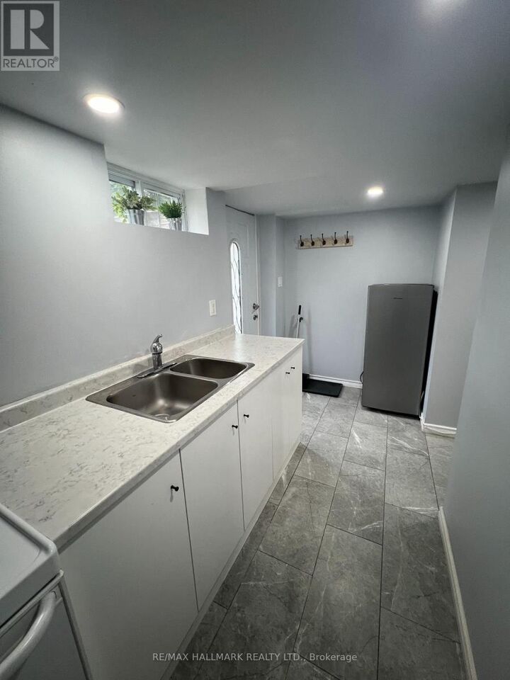 Property Photo:  102 Barton Avenue #Basement  ON M6G 1P6 