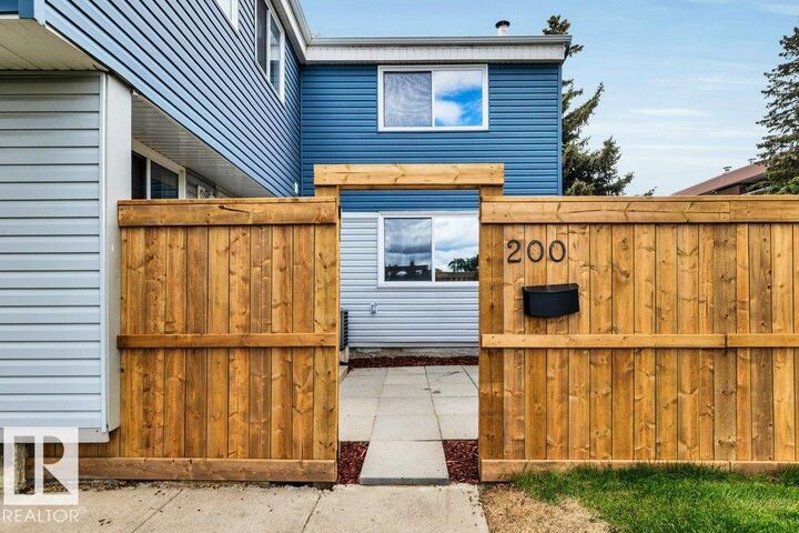Property Photo: 14707 53 Avenue NW 200 AB T6H 5C9