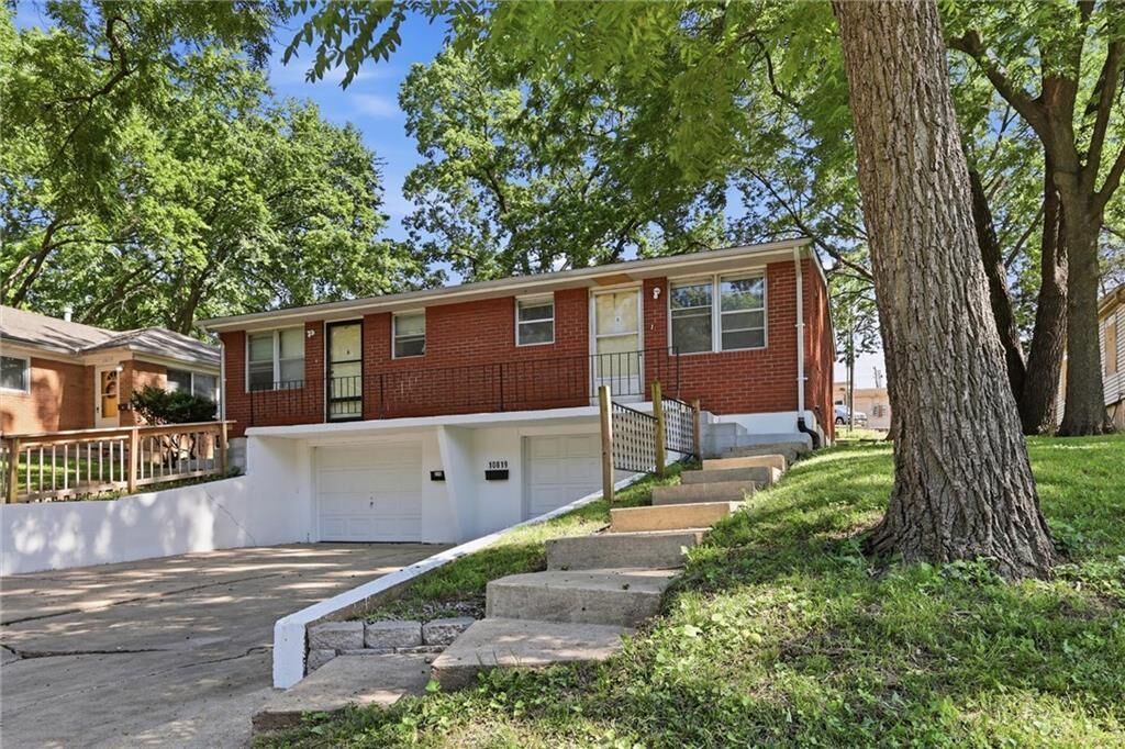 Property Photo:  10819 E Westport Road  MO 64052 