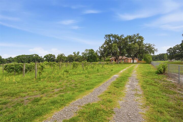 Property Photo: 6611 W Knights Griffin Road FL 33565