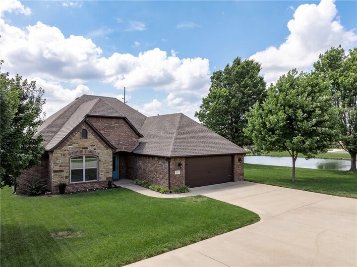 Property Photo:  4002 SW Flatrock Cove  AR 72713 