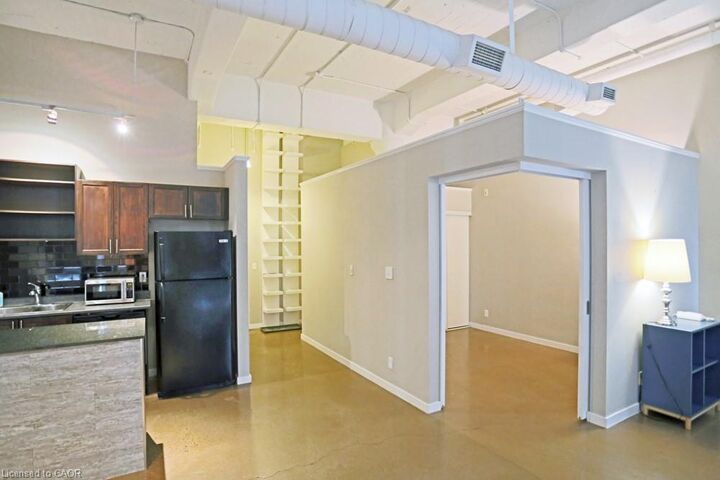 Property Photo:  404 King Street W 113  ON N2G 4Z9 