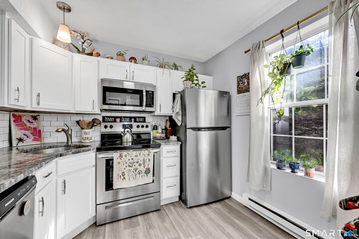 Property Photo:  745 Merrow Road 111  CT 06238 