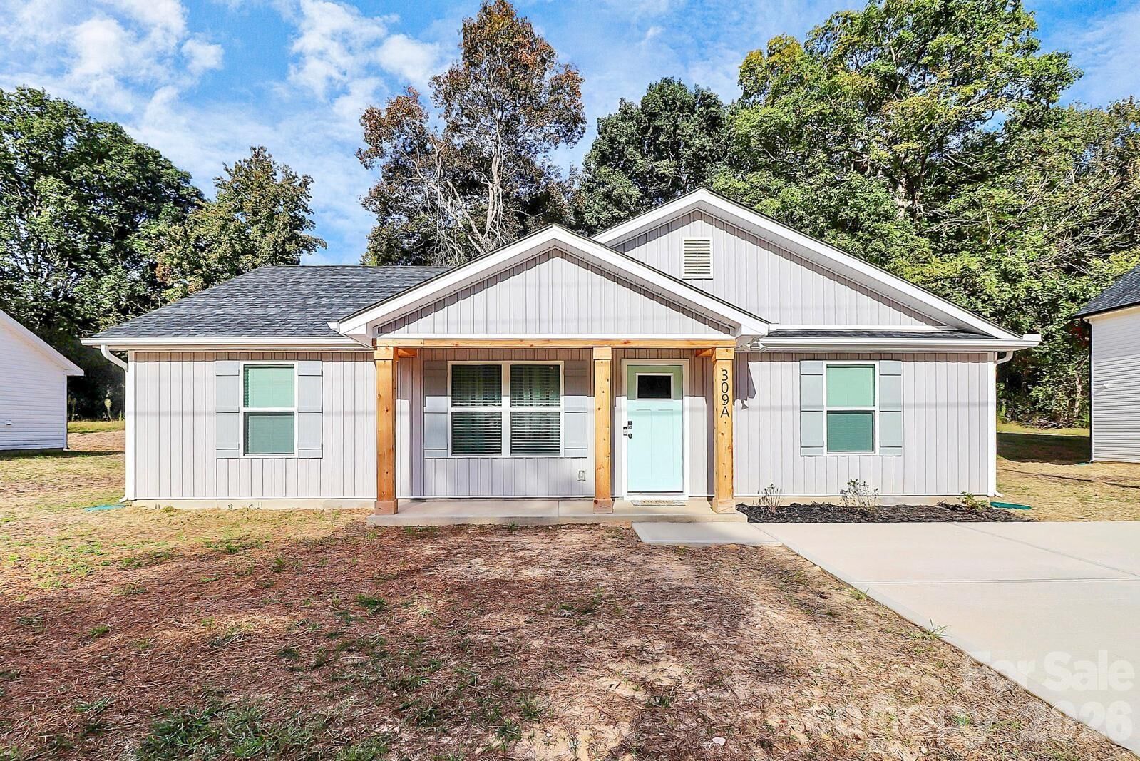 Property Photo:  309 Oakdale Avenue  NC 28083 