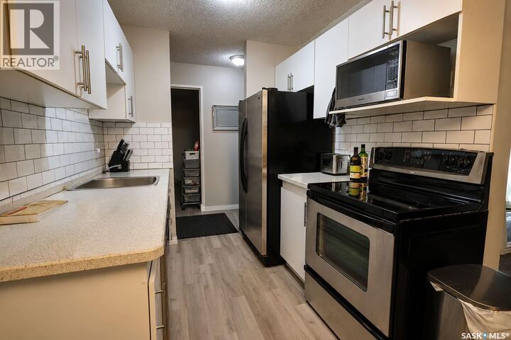 Property Photo:  514 1580 Olive Diefenbaker Drive  SK S6V 7M6 