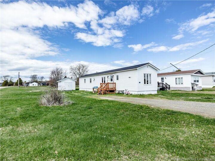 Property Photo:  48 Rue Des Copains  NB E4W 3X7 