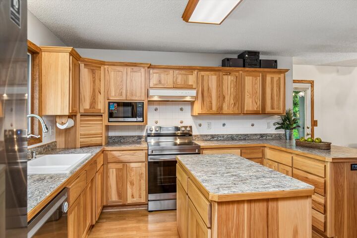 Property Photo: 326 Warner Avenue N MN 55115