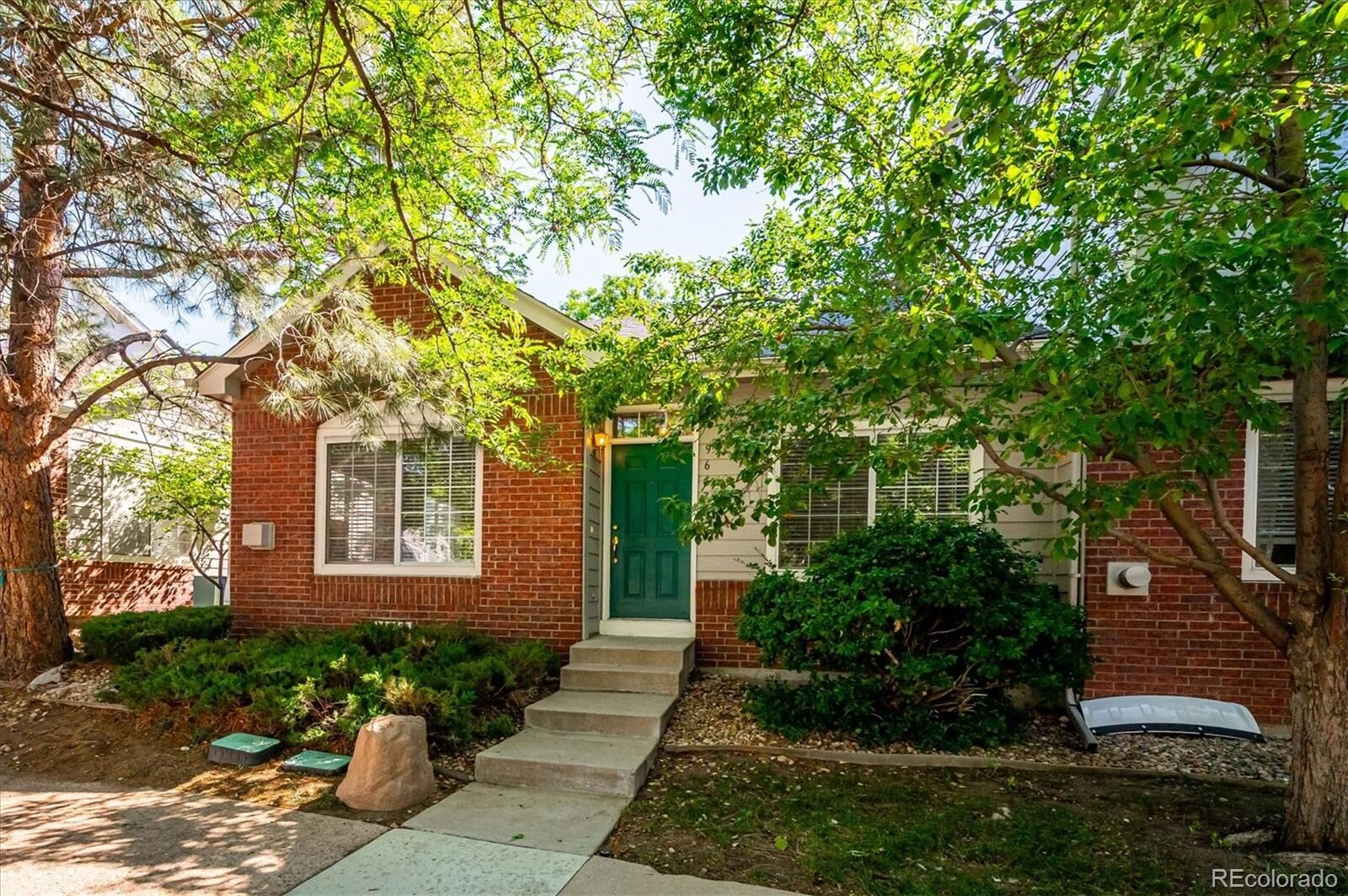 Property Photo:  9647 W Chatfield Avenue A  CO 80128 