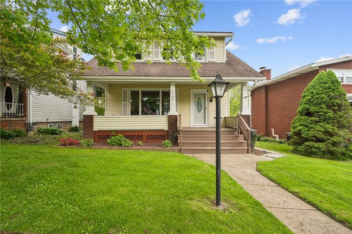 Property Photo:  1709 Moore Ave  PA 15673 