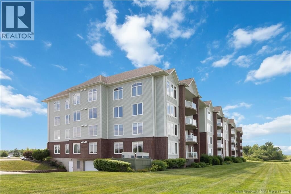 Property Photo:  185 Royal Oaks Boulevard Unit# 208  NB E1H 2P7 