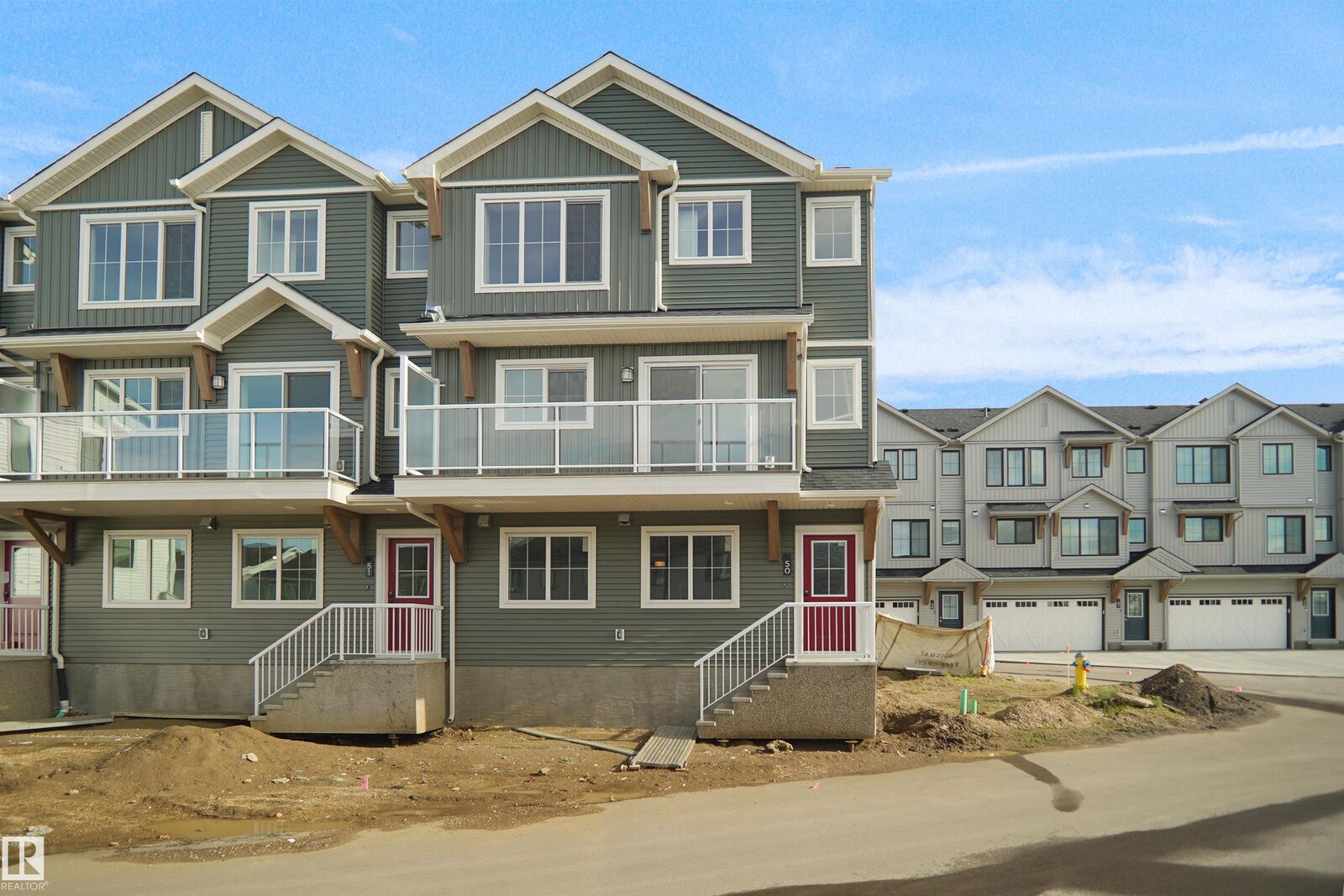 Property Photo:  525 Secord Boulevard NW 65  AB T5T 7V3 