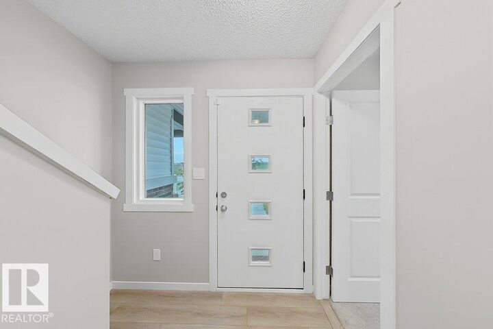Property Photo: 5034 Rivers Edge Way NW AB T6M 1P9