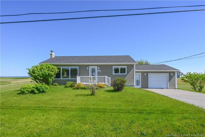 Property Photo:  1222 Chiasson Road  NB E8S 3E5 