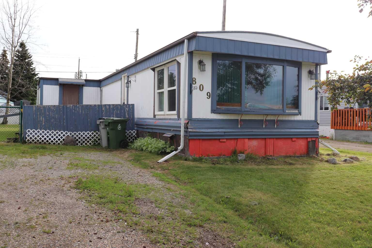 Property Photo: 809 52 Street AB T7E 1K4