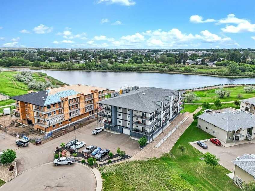 Property Photo: 499 Meadow Lake Court 301 AB T1R 0Y7