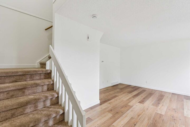 Property Photo: 32 Castleglen Way NE AB T3J 1T3