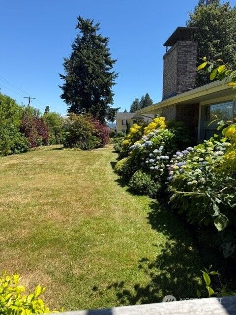 Property Photo:  10779 NE Valley Road  WA 98110 