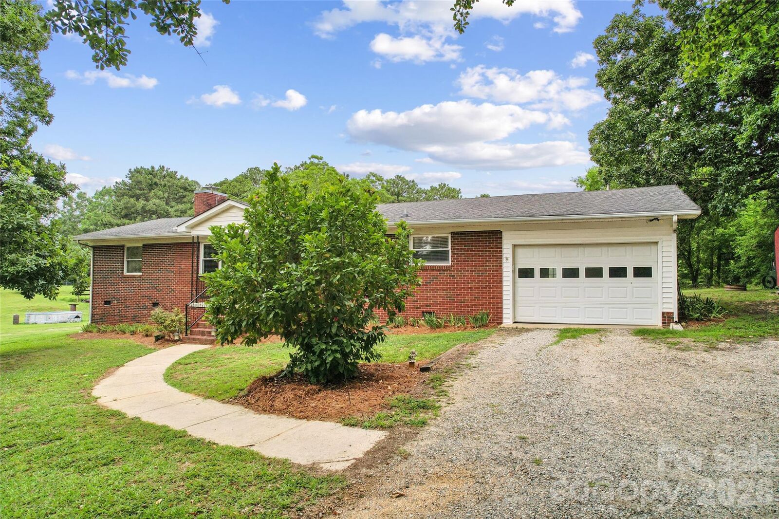Property Photo:  604 Archibald Road  NC 28025 