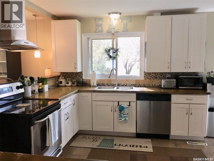 Property Photo: 114 Gladstone Avenue S SK S3N 2B5