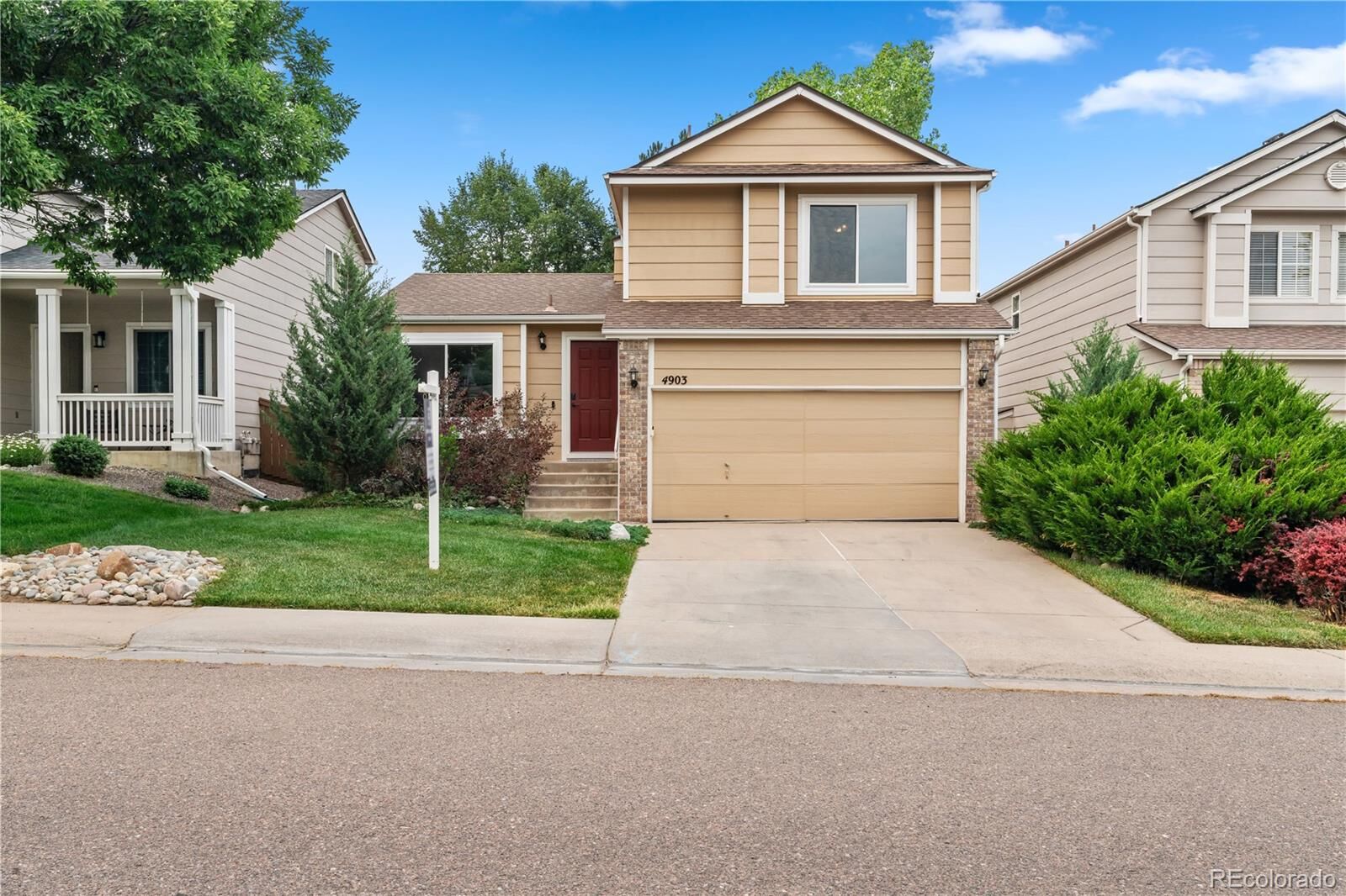 Property Photo:  4903 Apollo Bay Drive  CO 80130 